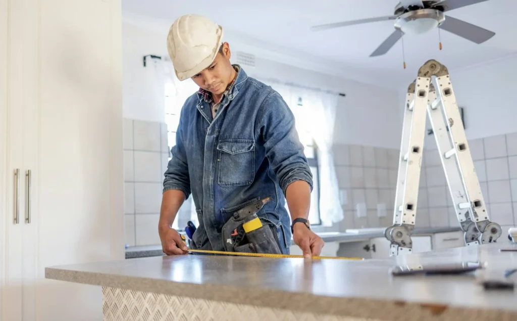 imgi 34 construction measurement and handyman doing home repair renovation and building a counter servic